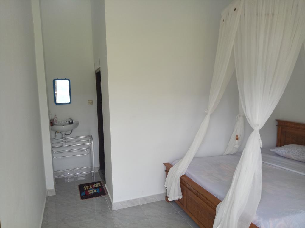 Aris Homestay And Warung Made Мундук Экстерьер фото