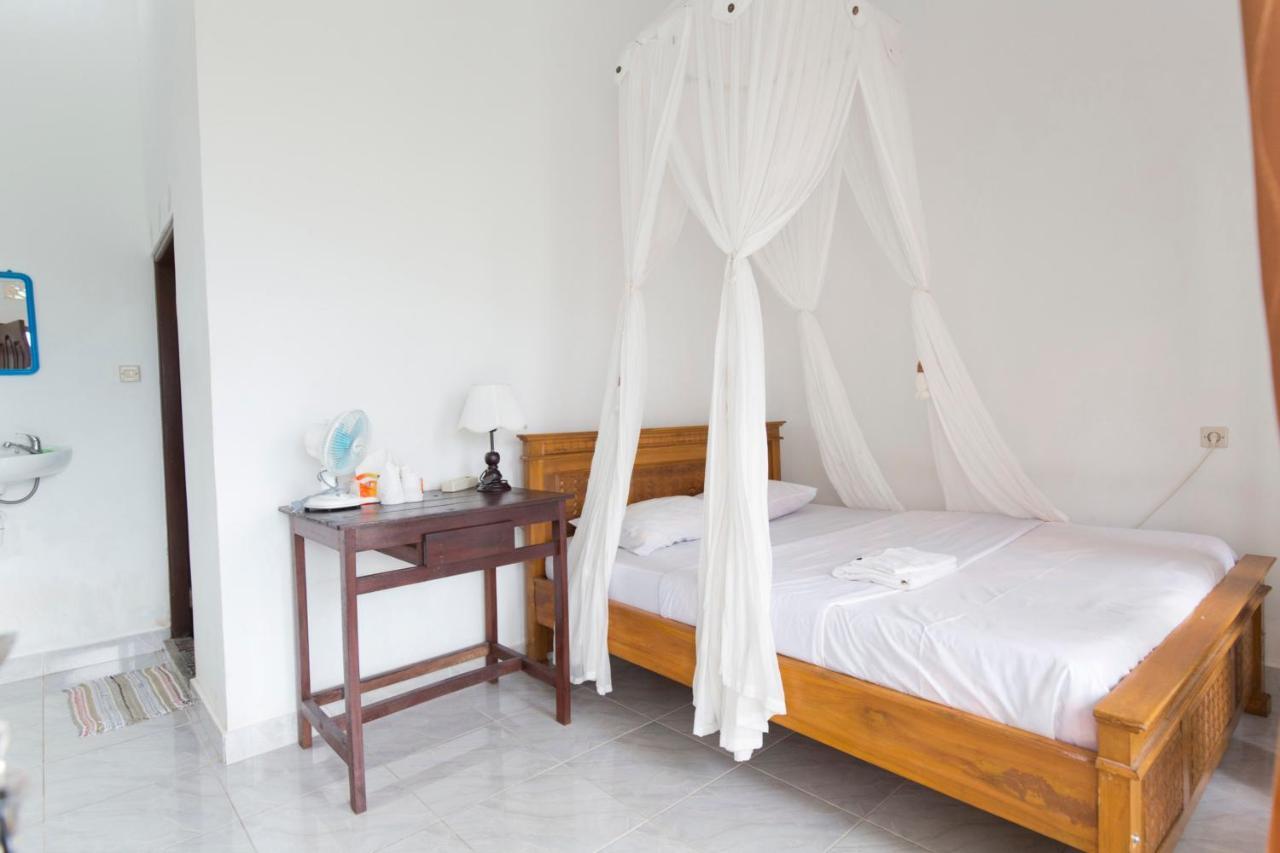 Aris Homestay And Warung Made Мундук Экстерьер фото